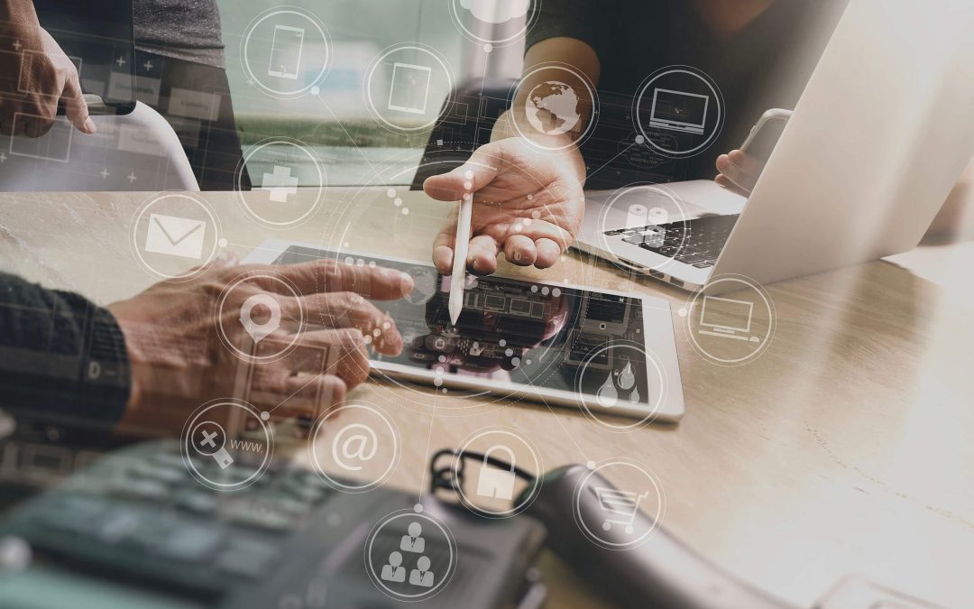 Image of a hand holding a pen and pointing at a tablet, representing focus on value selling strategies and digital tools for enhancing sales effectiveness, and demosstrating Increased uncertainty and competition